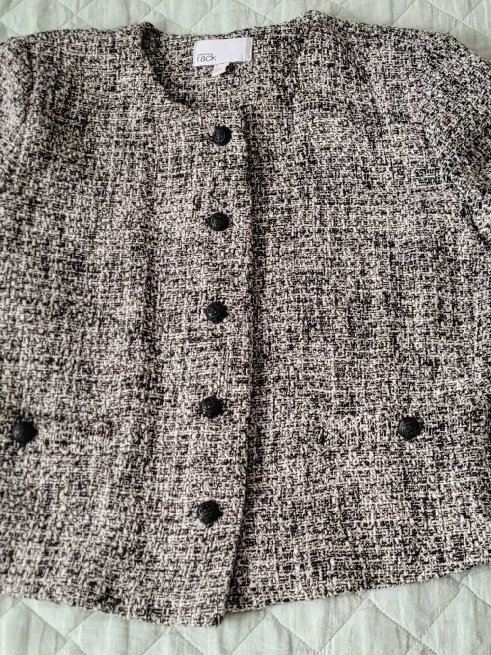 Short button up black and white size small suit style jacket.